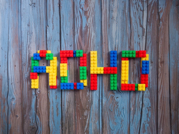 Photo the brick toys multi color adhd word for sci or education concept