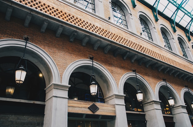 Brick vintage building with lamp hanging