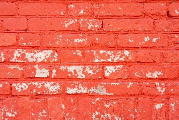 Photo brick wall is painted red in architectural background