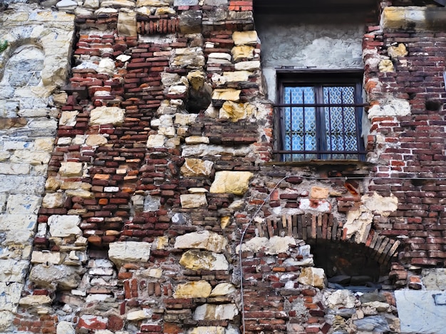 Foto muro di mattoni di un vecchio edificio