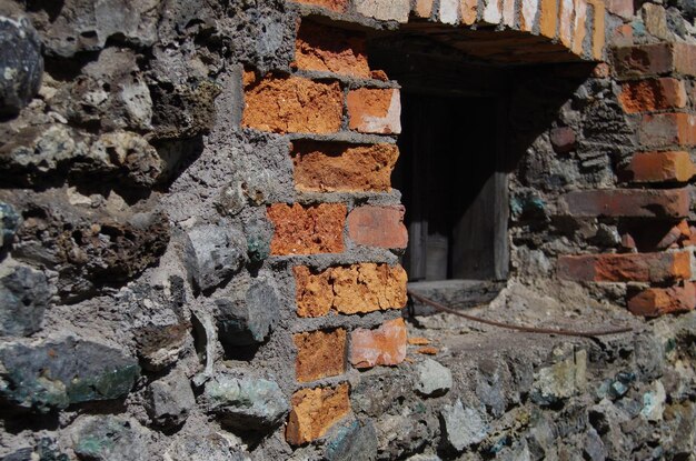 Foto muro di mattoni di un vecchio edificio