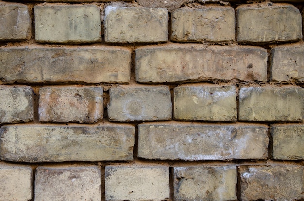 Brick wall old ruined building Building ready to be demolished Texture Empty background