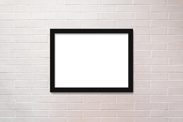 brick wall painted in white and a horizontal picture frame