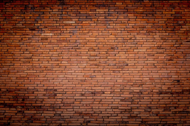 Photo brick wall of red wide panorama. background of old vintage brick wall