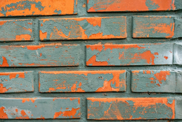 Brick wall texture background with peeling paint