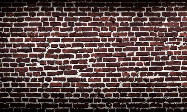 A brick wall with a black background