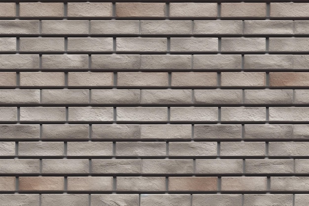 灰色のレンガ壁の背景を持つレンガ壁。