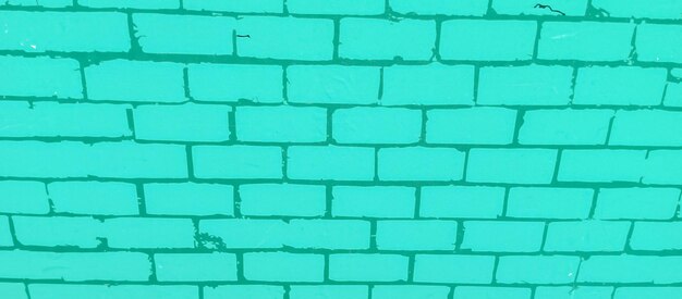 Photo a brick wall with a green brick that saysbrickon it