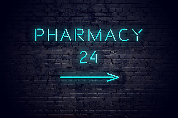 Brick wall with neon arrow and sign pharmacy 24.