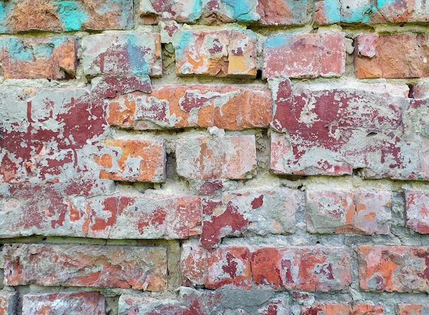 a brick wall with a red and blue color.