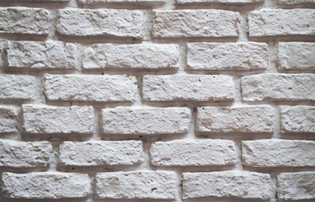 a brick wall with a white brick background.