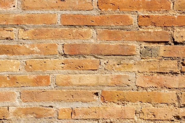 Foto un muro di mattoni con sopra la parola mattone