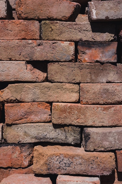 Brickwork texture background of bricks construction material\
red stone lots of red bricks