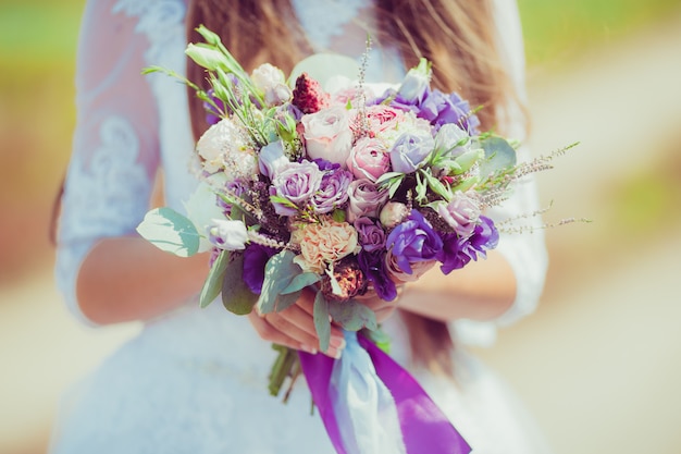 Bridal beautiful romantic bouquet of various flowers