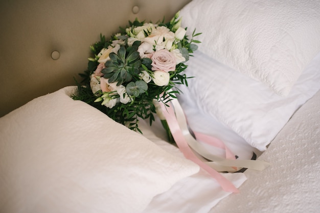 Bridal bouquet of flowers of the bride close up