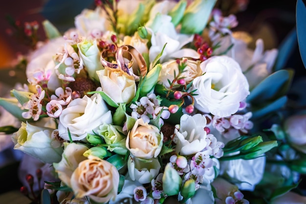 Bridal bouquet of roses with rings