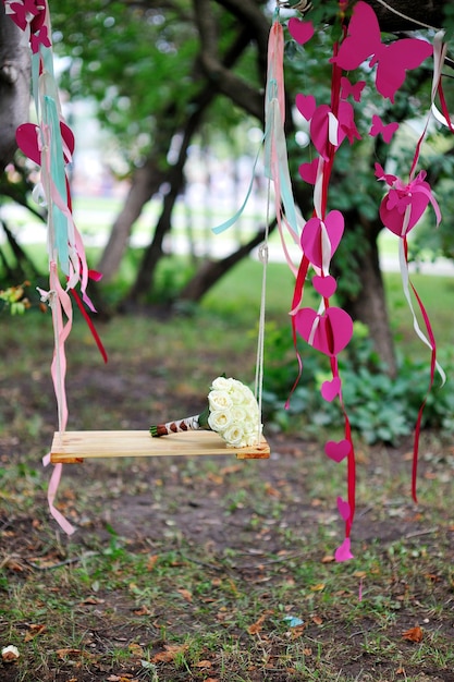 Bridal bouquet on swing