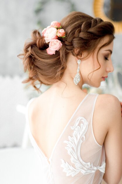 Photo bridal hairstyle with fresh flowers