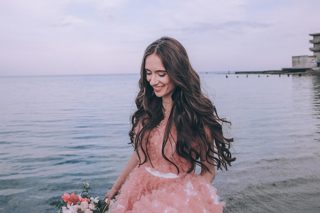 Bride on beach near sea