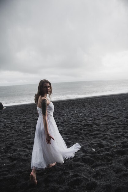 bride on a black sand beach in Iceland