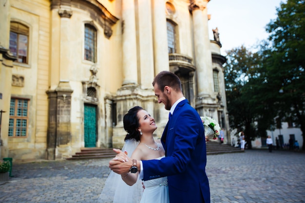 Bride dancing in the street