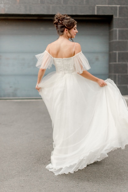 Bride dancing on the street