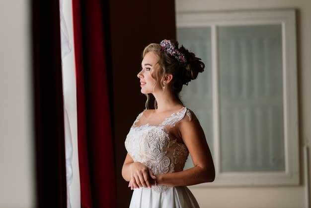 Bride in an elegant dress and wreath