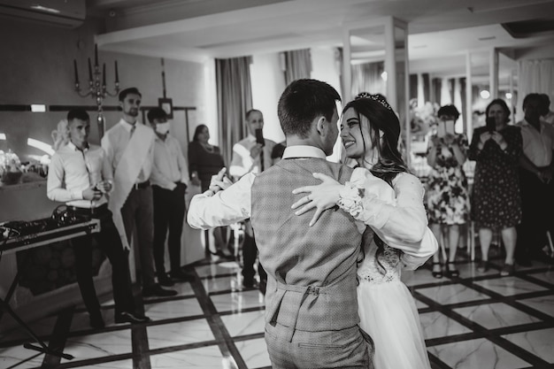 The bride and groom are dancing. Waltz, the bride and groom's dance