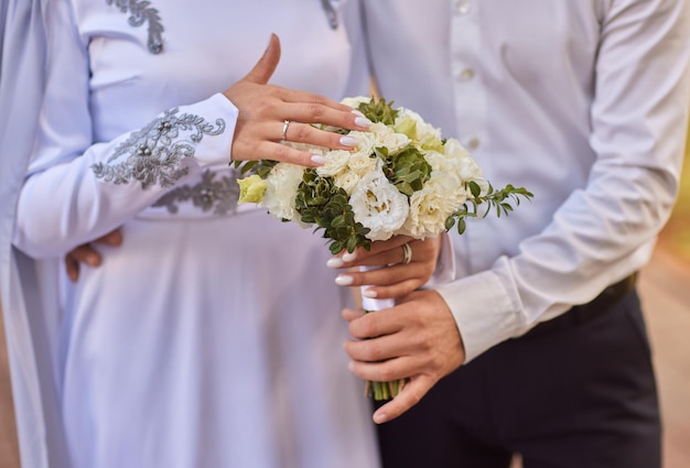 Bride and groom Asian Muslims marry in a beautiful red love theme celebration nikah day