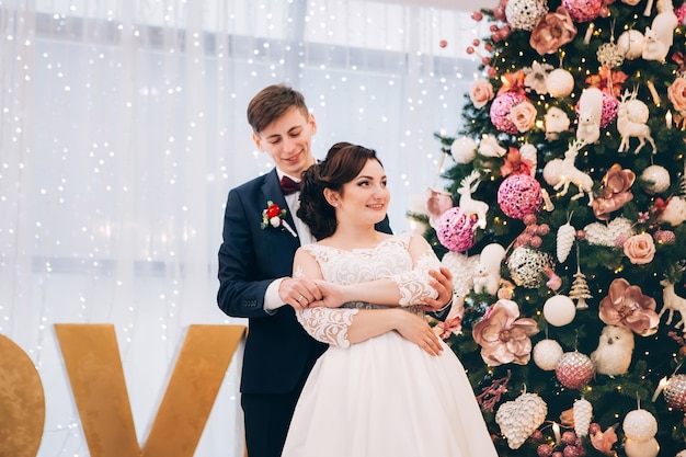 Bride and groom on Christmas time