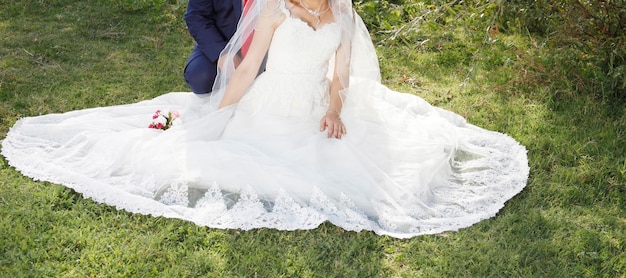 Bride and groom on the grass