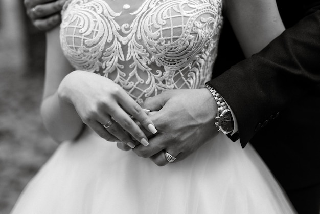 The bride and groom held hands