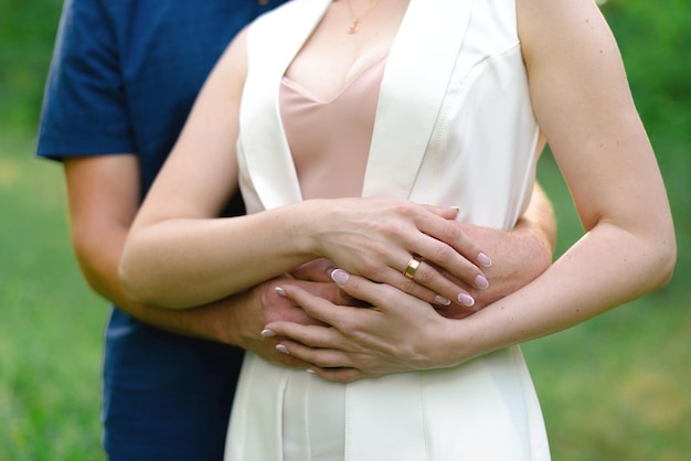 bride and groom holding hands together