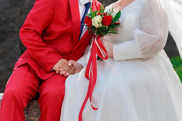 Bride and groom holding hands