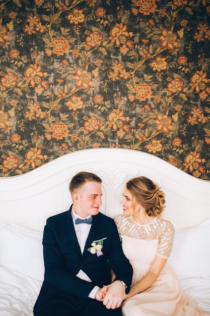 Bride and groom hugging on wedding day