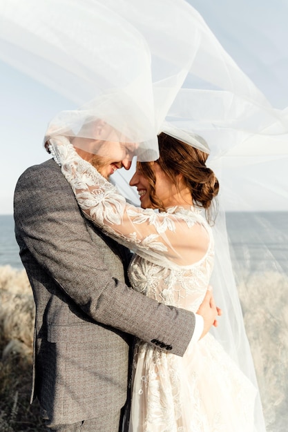 Bride and groom hugging