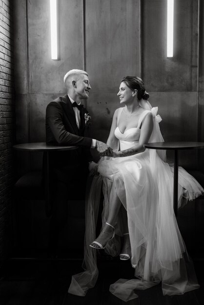 Bride and groom inside a cocktail bar