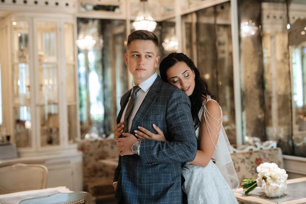 Bride and groom inside a cocktail bar