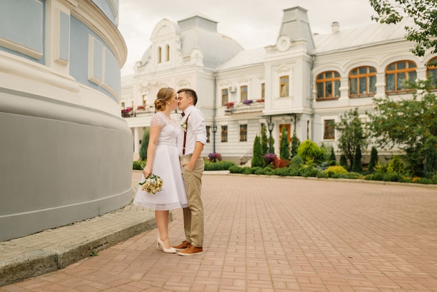 Bride and groom kiss after the wedding ceremony