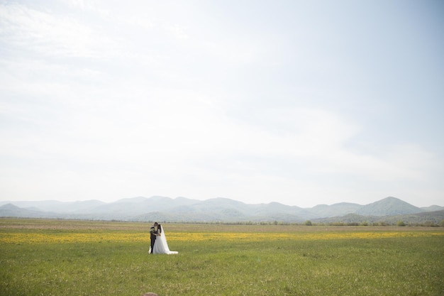 Bride and groom on nature