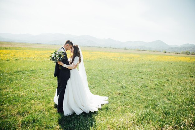 Bride and groom on nature