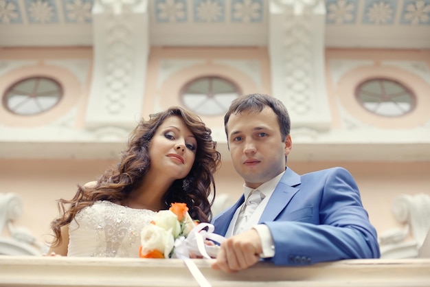 bride and groom in an old mansion