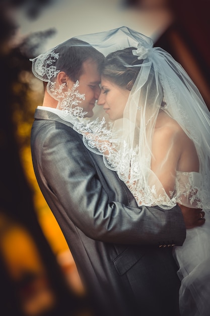 Bride and groom in the park