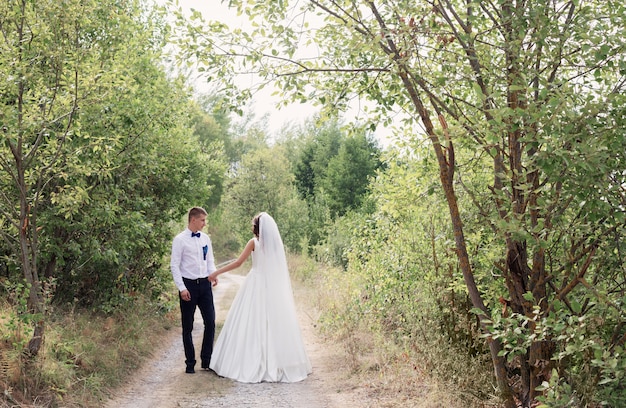 Bride and groom in park