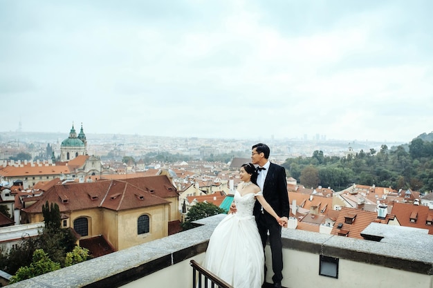 Bride and groom on roof