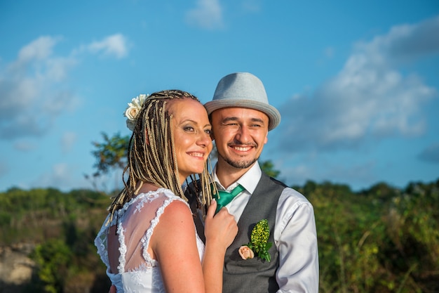 Bride and groom smiling