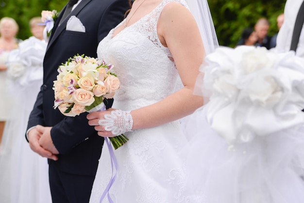 Bride and groom standing together on ceremony