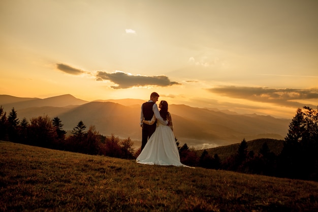 Bride and Groom at Sunset Romantic Married Couple