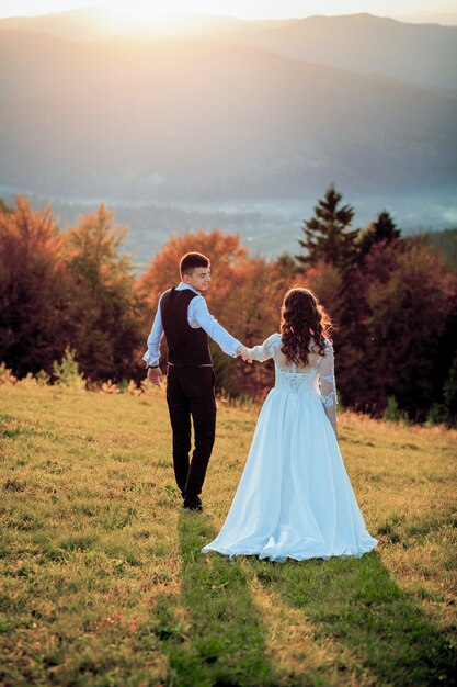 Bride and Groom at Sunset Romantic Married Couple