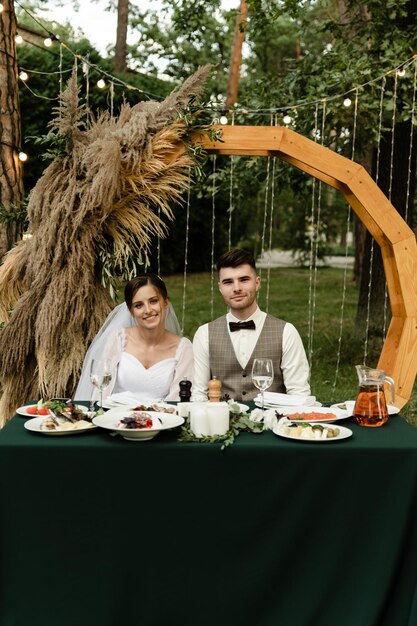 Bride and groom at the table